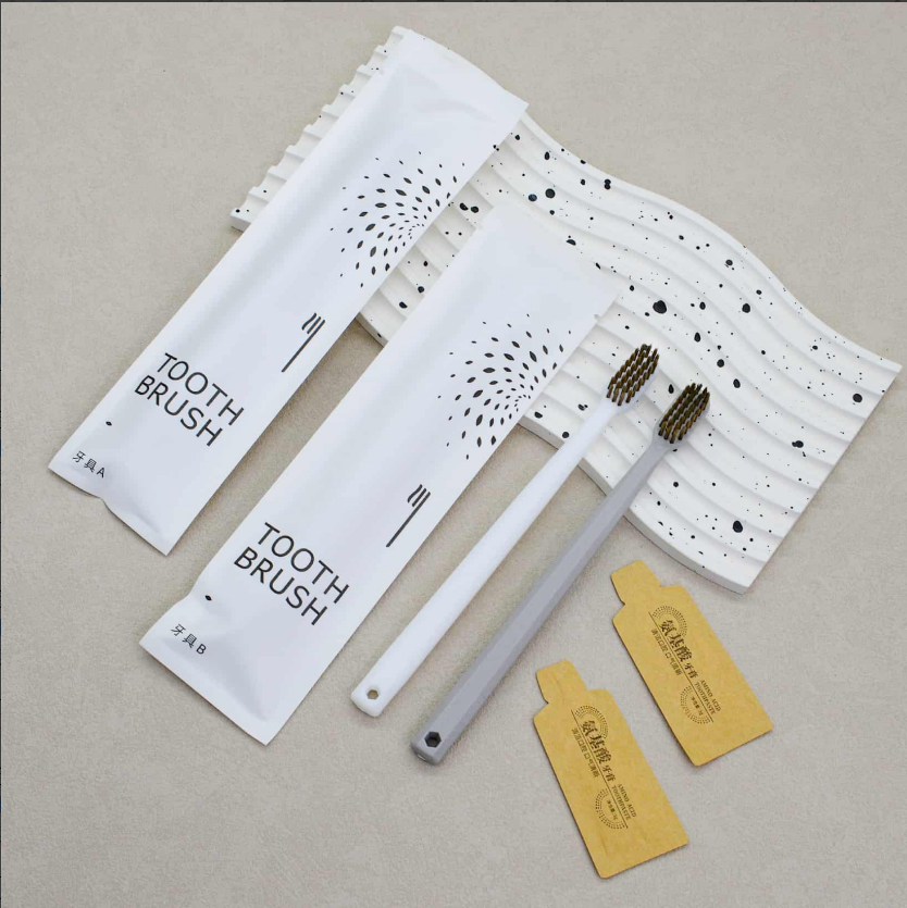 通货-灰白八角喷砂石头纸（送纸袋牙膏）牙刷克重：全新料10克pp聚丙烯 刷毛：0.15mm咖棕火焰毛 牙膏：3g氨基酸牙膏 包装：三边封石头纸 孔数：31孔（1000/箱）整箱发货