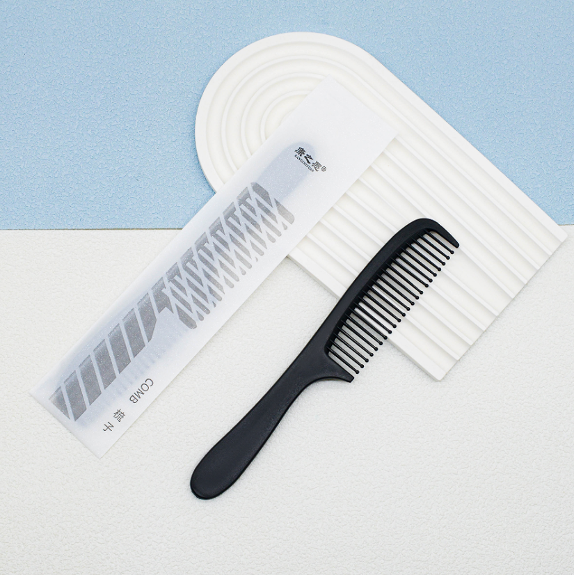 星光膜 黑半月梳梳子克重：10克 材质：pp 包装：12丝星光膜