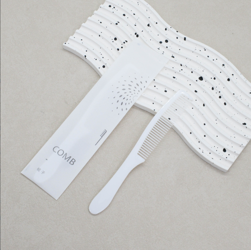 通货-白大丽枫梳星光膜丽枫款 梳子克重：13.5克 梳子材质：全新料pp聚丙烯 包装：12丝星光膜（2500/箱）整箱发货