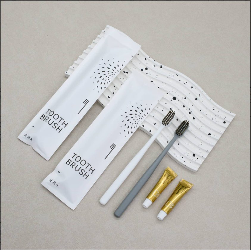 通货-灰白大头圆柱6g氨基酸石头纸牙刷克重：全新料8克pp聚丙烯 刷毛：0.15mm咖棕火焰毛 牙膏：6g氨基酸牙膏 包装：三边封石头纸 孔数：31孔（1000/箱）整箱发货