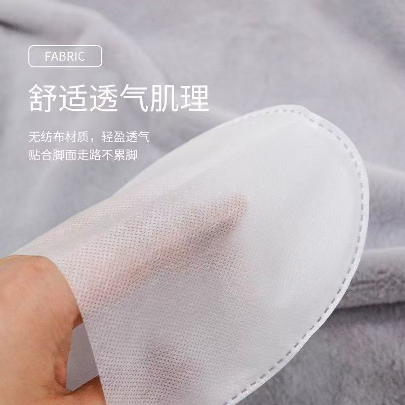 一次性拖鞋 PP白色无纺布（每包500双）鞋底：160克泡泡纹 帮面：30克无纺布  盖面：50克无纺布（500/包）整包发货