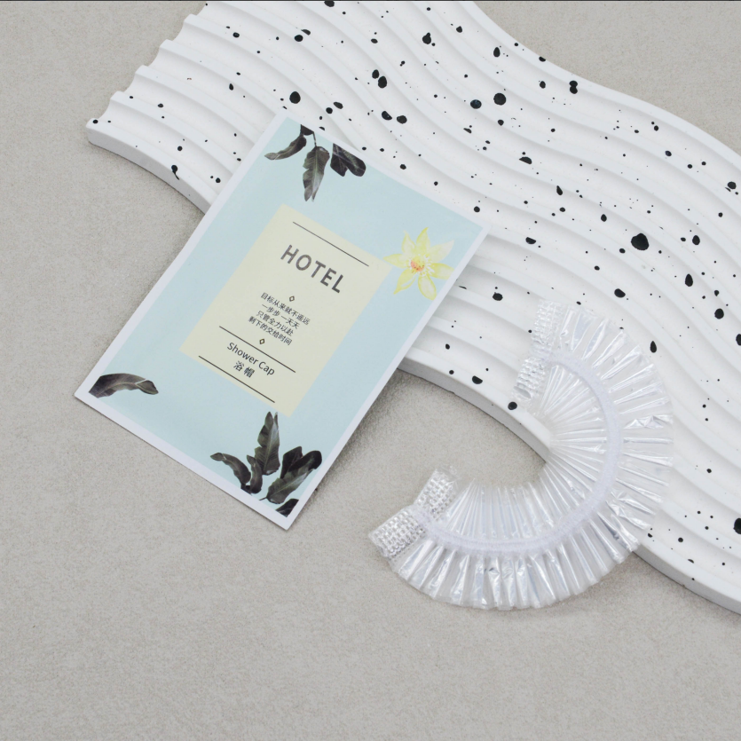 浴帽环保涂层纸浴帽：高压浴帽 包装：三边封环保涂层纸（2000/箱）整箱发货